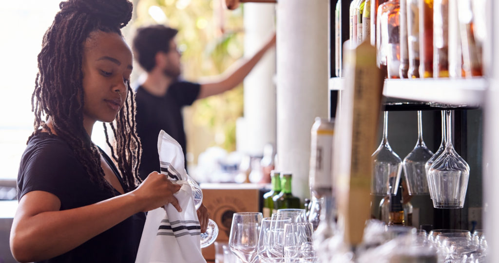 waitress using kitchen and bar towels