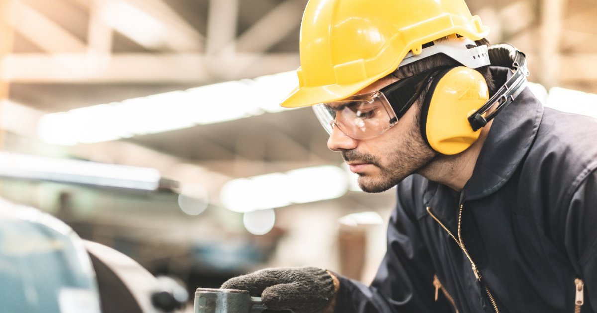 Industrial engineers in hard hats. Work at the Heavy Industry Manufacturing Factory